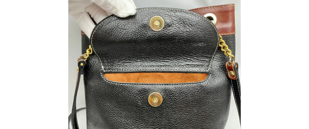 Vtg Bally Double Strap Leather Bucket Shoulder Bag in Black/Tan, made in Italy