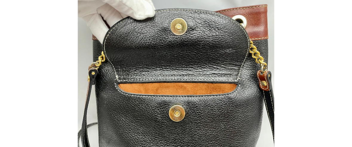 Vtg Bally Double Strap Leather Bucket Shoulder Bag in Black/Tan, made in Italy